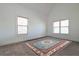 An empty room with white walls and two windows, creating a bright atmosphere at 510 Boulder View Parkway, Dallas, GA 30157