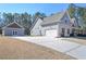 Stylish single-Gathering home with an attached garage, separate building, and concrete driveway at 510 Boulder View Parkway, Dallas, GA 30157