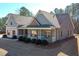 Beautiful single-Gathering home featuring wood and brick accents and a charming front porch at 510 Boulder View Parkway, Dallas, GA 30157