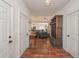 Spacious foyer with hardwood floors, white doors, and views to the living room at 510 Boulder View Parkway, Dallas, GA 30157