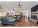 Bright and open living room featuring hardwood floors, a fireplace, and ample seating at 510 Boulder View Parkway, Dallas, GA 30157