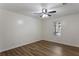 Spacious, bare bedroom with hardwood floors and bright natural light at 602 Country Park Se Dr, Smyrna, GA 30080