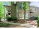 Exterior view showcasing a walkway, decks, manicured bushes, and a serene setting at 602 Country Park Se Dr, Smyrna, GA 30080