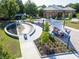 Outdoor community space featuring a splash fountain and shaded seating areas at 602 Country Park Se Dr, Smyrna, GA 30080