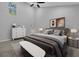 Bright bedroom with a ceiling fan, window, bench and nightstand at 1080 Westmont Sw Rd, Atlanta, GA 30311