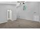 Bright bedroom with neutral walls, carpeted floor, and a ceiling fan, offering a calm and inviting atmosphere at 1080 Westmont Sw Rd, Atlanta, GA 30311