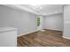 Dining room with hardwood floors, modern lighting fixture and plenty of space at 1080 Westmont Sw Rd, Atlanta, GA 30311
