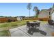Spacious backyard featuring a patio with outdoor furniture and well-maintained landscaping at 265 Riverclub Rd, Acworth, GA 30101