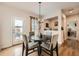 Bright breakfast nook featuring modern lighting, stylish decor, and outdoor views at 265 Riverclub Rd, Acworth, GA 30101