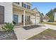 Inviting front porch with beautiful stone details, nice landscaping and room for seating at 265 Riverclub Rd, Acworth, GA 30101