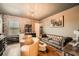 A well-decorated living room has hardwood floors and a leather couch at 265 Riverclub Rd, Acworth, GA 30101