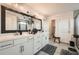 Spacious main bathroom with dual sinks, granite countertop, and modern lighting at 265 Riverclub Rd, Acworth, GA 30101