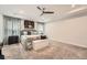 Expansive main bedroom with tray ceilings, luxury carpet, and modern, neutral decor at 265 Riverclub Rd, Acworth, GA 30101