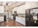 Well-equipped kitchen with stainless steel appliances, granite countertops, and ample cabinet space for all your needs at 4835 Liberty Rd, Villa Rica, GA 30180