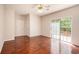 Cozy bedroom with hardwood floors, closet, and a sliding door to the outside at 5975 Tate Dr, Austell, GA 30106