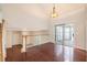 Upstairs loft area overlooks the living room, featuring hardwood floors and natural lighting at 5975 Tate Dr, Austell, GA 30106