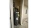 Image shows a hot water heater in the basement at 2166 Villa Spring Ct, Dacula, GA 30019