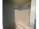 Bathroom with tub and shower combination and light blue paint at 2166 Villa Spring Ct, Dacula, GA 30019