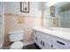 Bathroom showcasing tiled walls and a white vanity at 4812 Pamela Nw Ct, Acworth, GA 30101
