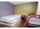 Bedroom view showing hardwood floors and two twin beds at 4812 Pamela Nw Ct, Acworth, GA 30101