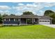 Charming single-story home with a well-manicured lawn, attached garage, and classic design at 4812 Pamela Nw Ct, Acworth, GA 30101
