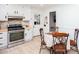 Bright kitchen with white cabinets and tile flooring at 4812 Pamela Nw Ct, Acworth, GA 30101