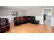 Spacious living room with an adjacent doorway and hardwood floors at 4812 Pamela Nw Ct, Acworth, GA 30101