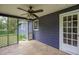 Cozy screened porch with stone floors, access to yard, providing a relaxing outdoor living space at 4812 Pamela Nw Ct, Acworth, GA 30101