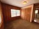 Cozy bedroom featuring a window, closet, and neutral carpeting, perfect for relaxation at 5760 Brenda Sw Dr, Mableton, GA 30126