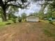 Detached garage with ample space, offering secure parking and additional storage at 5760 Brenda Sw Dr, Mableton, GA 30126