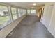 Bright sunroom with many windows offering nice views and comfortable carpet at 5760 Brenda Sw Dr, Mableton, GA 30126