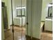 Spacious bathroom with double sinks, large mirrors, and a separate tub and shower area at 6848 Timberhead Way, Lithonia, GA 30058