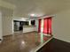 Open living and kitchen with hardwood floors and large windows, perfect for entertaining at 6848 Timberhead Way, Lithonia, GA 30058