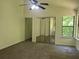 Spacious main bedroom with vaulted ceilings and large windows at 6848 Timberhead Way, Lithonia, GA 30058