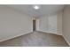 Neutral bedroom featuring carpet, recessed lighting, and single door closet at 8256 Milam Loop, Fairburn, GA 30213