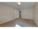 Carpeted bedroom featuring white walls, a closet with double doors, and an overhead light at 8256 Milam Loop, Fairburn, GA 30213