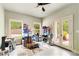Versatile bonus room featuring natural light from the large windows and neutral paint at 8901 Watkins Mill Rd, Winston, GA 30187