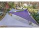 Aerial view of backyard deck with colorful shade sails and view of the playground at 1216 E Rock Springs Ne Rd, Atlanta, GA 30306