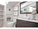 Bathroom with shelf decor and dark gray vanity at 1216 E Rock Springs Ne Rd, Atlanta, GA 30306