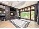 Modern bathroom featuring soaking tub, heated towel rack and picture window with trees at 1216 E Rock Springs Ne Rd, Atlanta, GA 30306