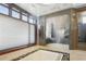 Elegant bathroom with a soaking tub, a heated towel rack, and a glass-enclosed shower at 1216 E Rock Springs Ne Rd, Atlanta, GA 30306