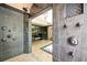 Lavish bathroom with multiple shower heads, sleek vanity, and spa-like design, offering an immersive experience at 1216 E Rock Springs Ne Rd, Atlanta, GA 30306