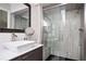 Bathroom with glass shower and dark gray vanity at 1216 E Rock Springs Ne Rd, Atlanta, GA 30306