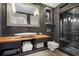 Modern bathroom featuring a glass shower, vessel sink, and wood countertop at 1216 E Rock Springs Ne Rd, Atlanta, GA 30306