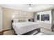 Bright bedroom with a king size bed, neutral decor, and a bay window at 1216 E Rock Springs Ne Rd, Atlanta, GA 30306