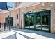 Exterior of house with large sliding glass doors and brickwork at 1216 E Rock Springs Ne Rd, Atlanta, GA 30306