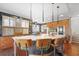 Contemporary kitchen featuring a large island with seating and modern pendant lighting at 1216 E Rock Springs Ne Rd, Atlanta, GA 30306
