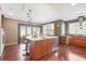 Modern kitchen featuring an island with seating, stylish countertops, and hardwood floors at 1216 E Rock Springs Ne Rd, Atlanta, GA 30306