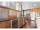 Custom kitchen with premium appliances, wine storage, and granite countertops at 1216 E Rock Springs Ne Rd, Atlanta, GA 30306