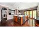 Open concept kitchen with large center island, stainless steel appliances, and wooden flooring at 1216 E Rock Springs Ne Rd, Atlanta, GA 30306